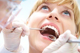 woman getting a dental cleaning