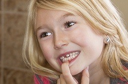 girl with missing teeth