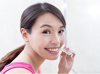 woman smiling with invisalign