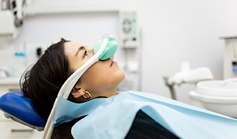 Woman wearing a nitrous oxide mask