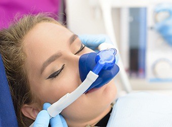 woman with nitrous oxide mask on