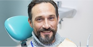 man with beard smiling