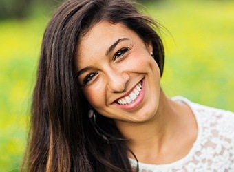 woman smiling outside