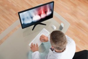 dentist at computer